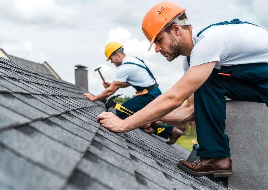 Roofers at work on a roof